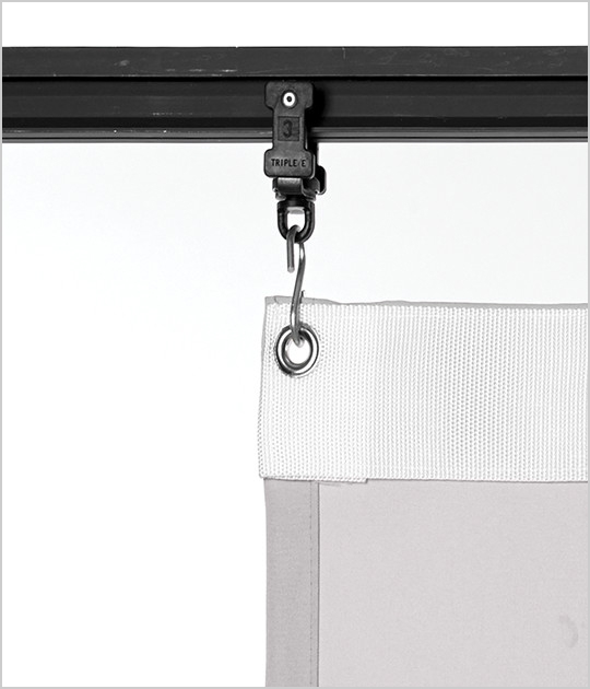 A curtain secured with an S-hook