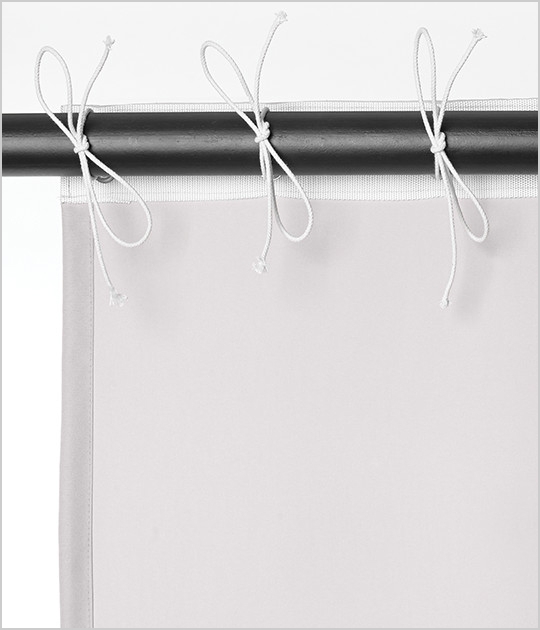 Curtain with hidden grommets