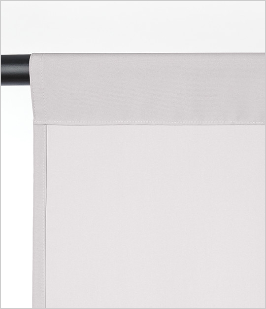 A curtain top finish with a sewn pocket sleeve