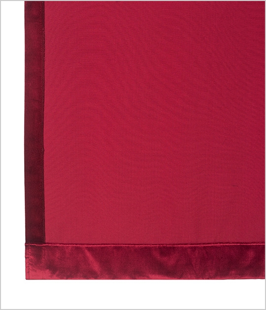 A red unlined curtain